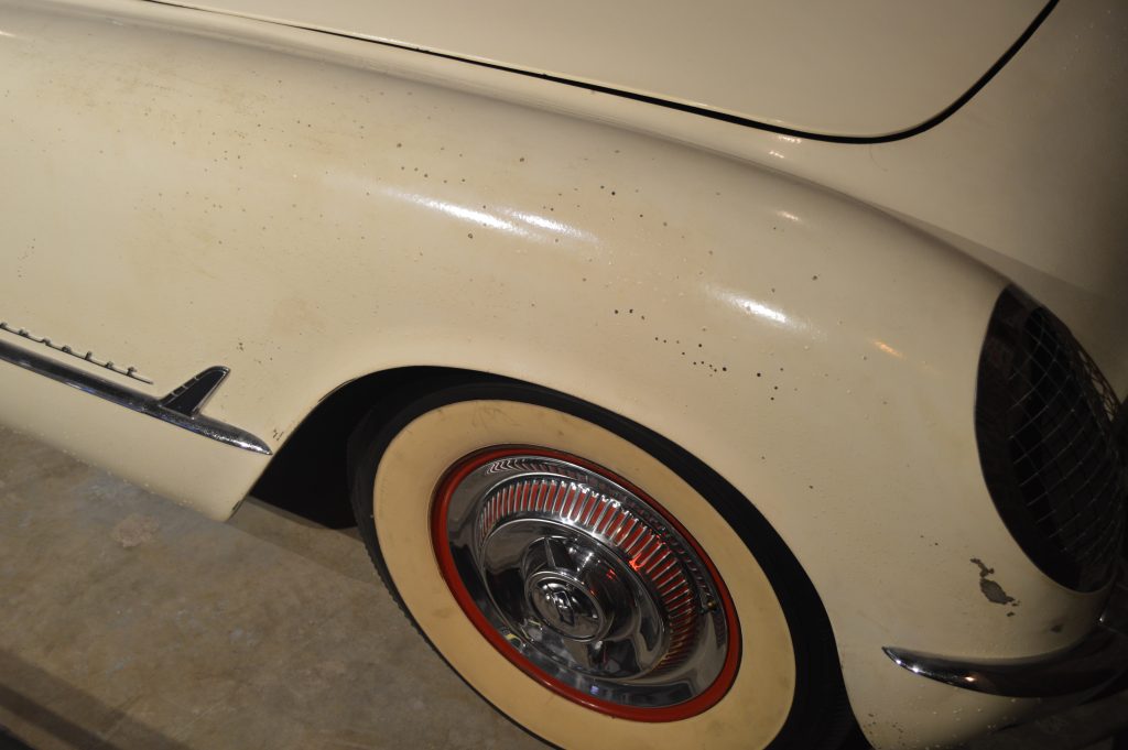 Notice the pitting, crazing and other deterioration of the original front fender due to neglect, poor air circulation, and the quality of the project used in 1954.